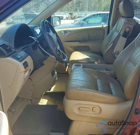 2010 Honda Odyssey Touring z USA, uszkodzony, nr VIN 5FNRL3H92AB007862